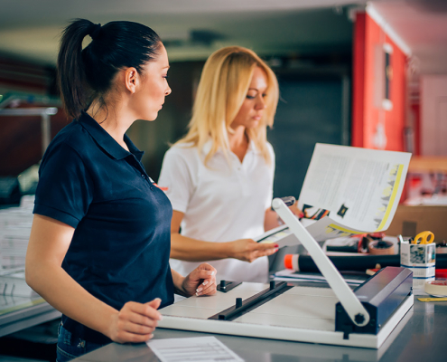Women Using Guillotine Finishing Print Women Using Guillotine Finishing Print